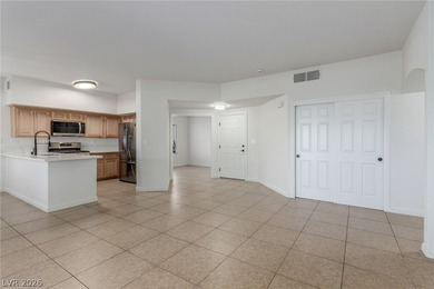 MOVE IN READY, FIRST FLOOR UNIT. Easy access to golf at Painted