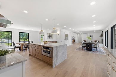 Welcome to this stunning, fully remodeled luxury home in the - photo 12