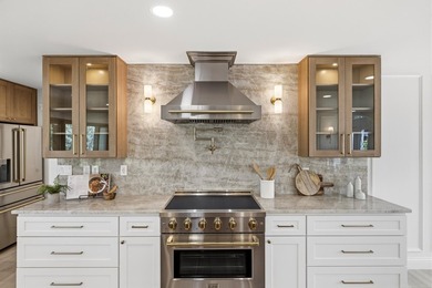 Welcome to this stunning, fully remodeled luxury home in the - photo 14