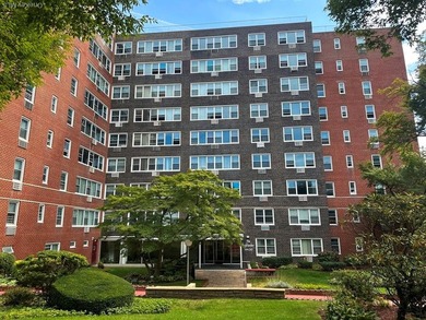 Experience elevated city living in this beautiful top-floor - photo 1