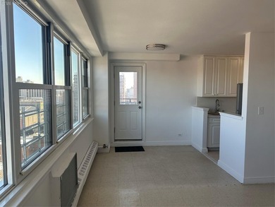 Experience elevated city living in this beautiful top-floor - photo 9