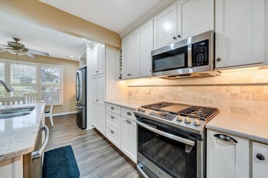 This gorgeous main-level living townhouse in Chestnut Villas is - photo 13