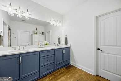 SHOWING LIKE A MODEL HOME, this exceptional custom-built - photo 28