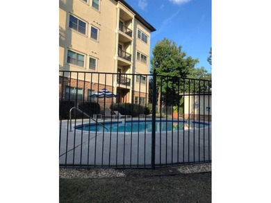 Enjoy Convenient In-Town Living in a Gated Community! This