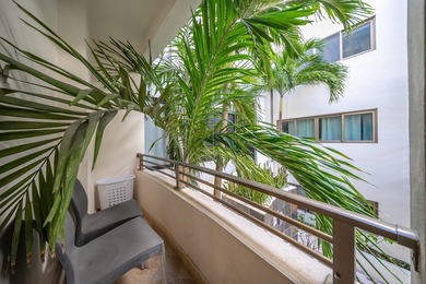 This spacious one-bedroom condominium is perfectly located in