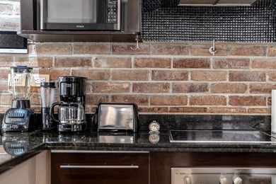 This spacious one-bedroom condominium is perfectly located in