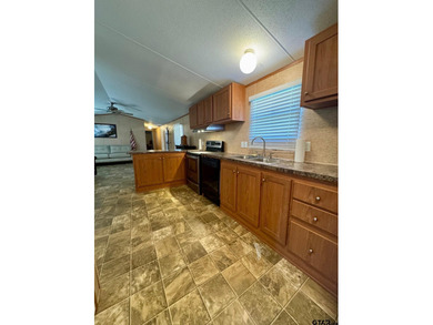 Very nice manufactured home on a beautiful lot in Thunderbird - photo 16