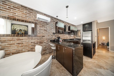 This spacious one-bedroom condominium is perfectly located in