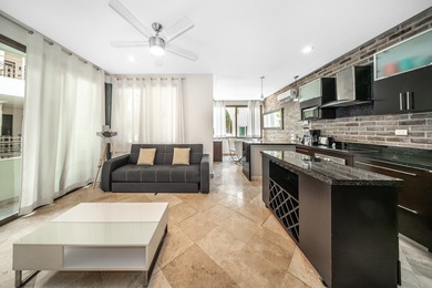 This spacious one-bedroom condominium is perfectly located in