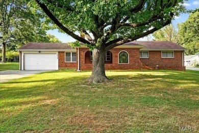 Beautiful all-brick home in St. Louis County featuring a rare