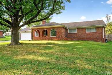 Beautiful all-brick home in St. Louis County featuring a rare