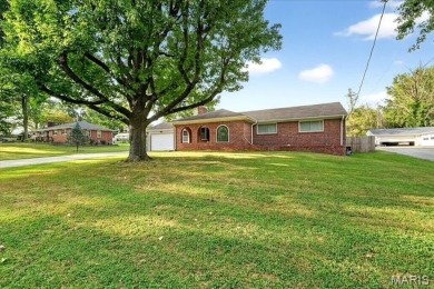 Beautiful all-brick home in St. Louis County featuring a rare