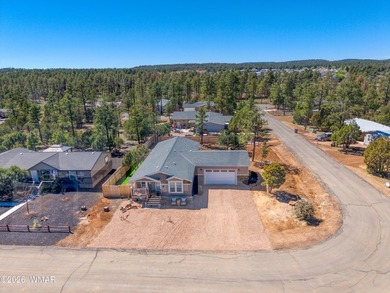 Built in 2023, this well-maintained Cavco home is situated on a - photo 3