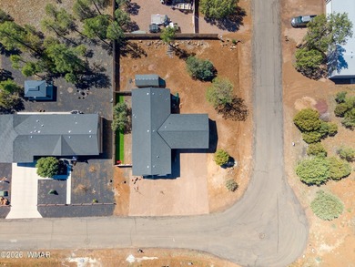 Built in 2023, this well-maintained Cavco home is situated on a - photo 4
