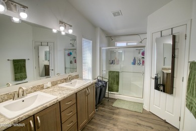 Built in 2023, this well-maintained Cavco home is situated on a - photo 6