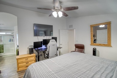 Built in 2023, this well-maintained Cavco home is situated on a - photo 7