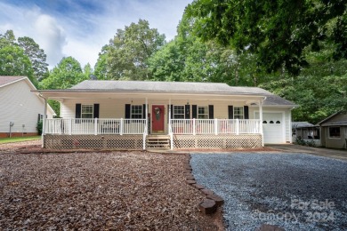 This adorable home is waiting on your full-time living or - Lake Home For Sale in Mount Gilead, North Carolina