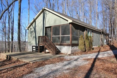 LAKE FRONT WITH PANORAMIC YEAR-ROUND LAKE VIEWS! YOU ARE LESS - photo 2