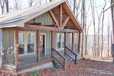 LAKE FRONT WITH PANORAMIC YEAR-ROUND LAKE VIEWS! YOU ARE LESS - photo 9