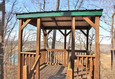 LAKE FRONT WITH PANORAMIC YEAR-ROUND LAKE VIEWS! YOU ARE LESS - photo 10