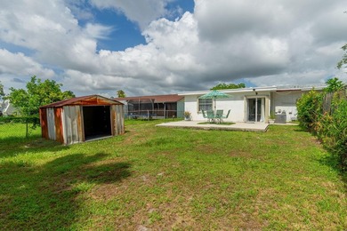 Centrally located in West Palm Beach, this spacious and - photo 23