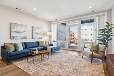 Welcome to refined urban living in this sun-drenched north/east