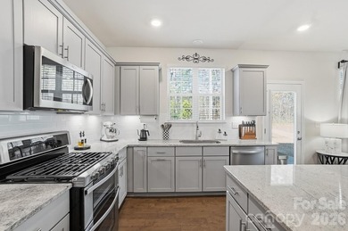 Welcome to this beautifully maintained two-story end-unit - photo 8