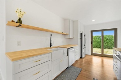 Coastal charm meets modern comfort in this beautifully renovated - photo 6