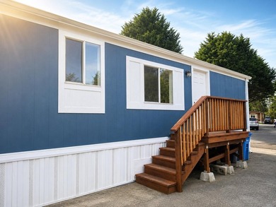 This is a charming, move-in-ready mobile home located in a - photo 2