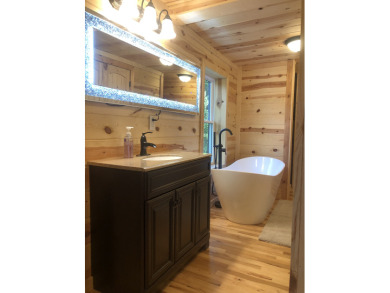 Hemlock Log Cabin 
Garage game room ,Jacuzzi - photo 14