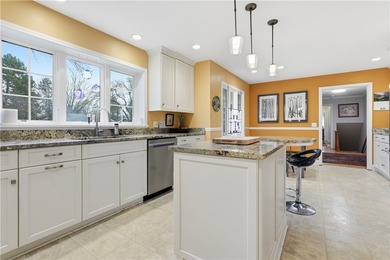 This beautifully updated 4-bedroom, 3.5-bath ranch sits on