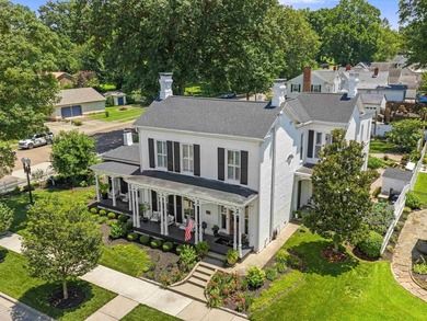 Situated on a large corner lot, 304 S. Main Street is a - photo 2