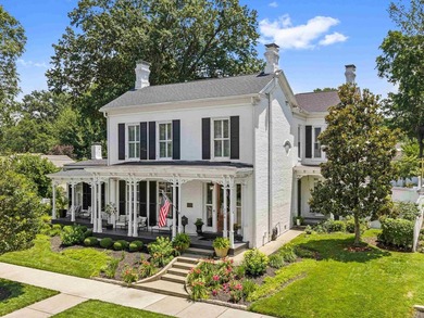 Situated on a large corner lot, 304 S. Main Street is a - photo 3