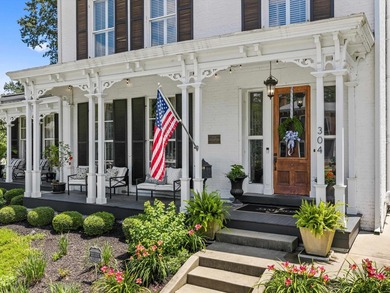 Situated on a large corner lot, 304 S. Main Street is a - photo 4
