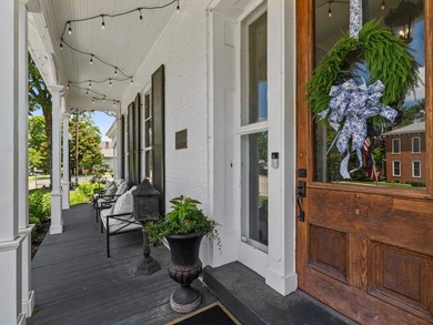 Situated on a large corner lot, 304 S. Main Street is a - photo 5