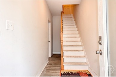 Welcome to 720 Waters Ave, a fully leased legal duplex in the - photo 5