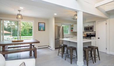 Indoor-Outdoor Living in Hampton Bays Situated south of the - photo 10