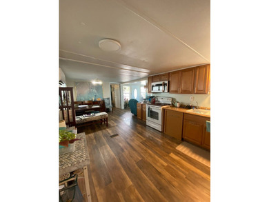 This home has 2 bedrooms, 1.5 bathrooms with a raised 10x16 - photo 12