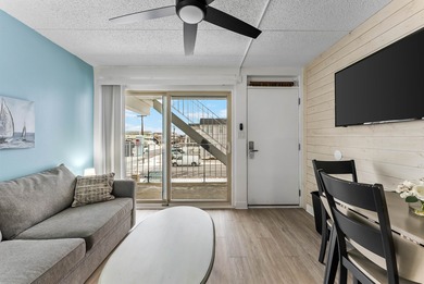 THIS IS IT! Turn key, beach block, 1 bedroom 1 bath condo with 2