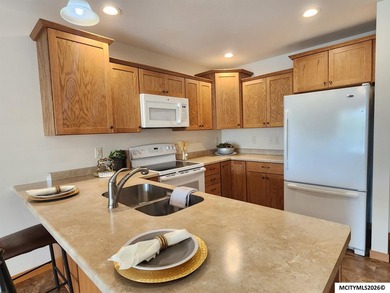 LUXURY LIVING AT AN AFFORDABLE PRICE! GARDEN PARK VILLAGE CONDOS - photo 3