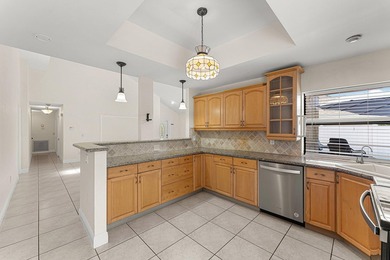Welcome to this charming 3-bedroom, 2-bathroom villa located in - photo 12