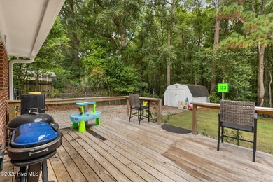 Nestled on a quiet, tree-lined street in an established - photo 22