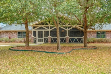 Set beneath a quiet canopy of live oaks, 636 Old Plantation Road - photo 4