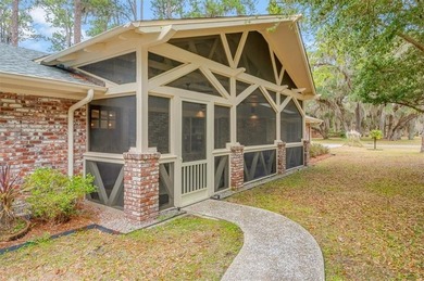 Set beneath a quiet canopy of live oaks, 636 Old Plantation Road - photo 5