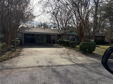 Looking for a large brick home? This one needs lots of TLC but - photo 3