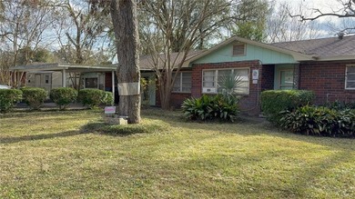 Looking for a large brick home? This one needs lots of TLC but - photo 4