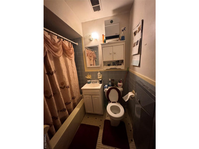 Excellent opportunity to own a brick semi-attached two-family - photo 3