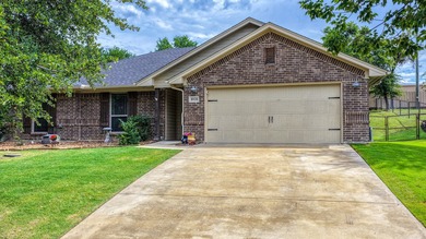 This stunning home is in pristine condition and sits on an - photo 1