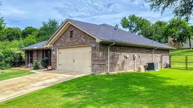 This stunning home is in pristine condition and sits on an - photo 4
