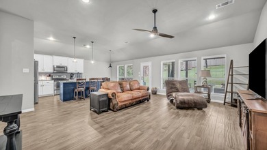 This stunning home is in pristine condition and sits on an - photo 5
